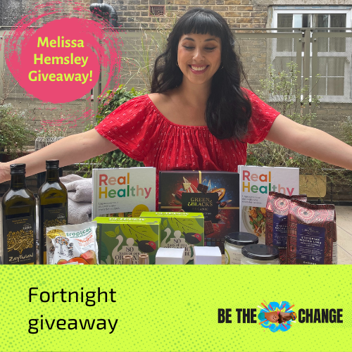 Melissa Hemsley standing behind a range of Fairtrade products