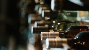 Wine bottles lying in a rack