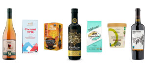 a selection of organic fairtrade products including wine and olive oil